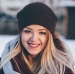 a girl in a snowy park